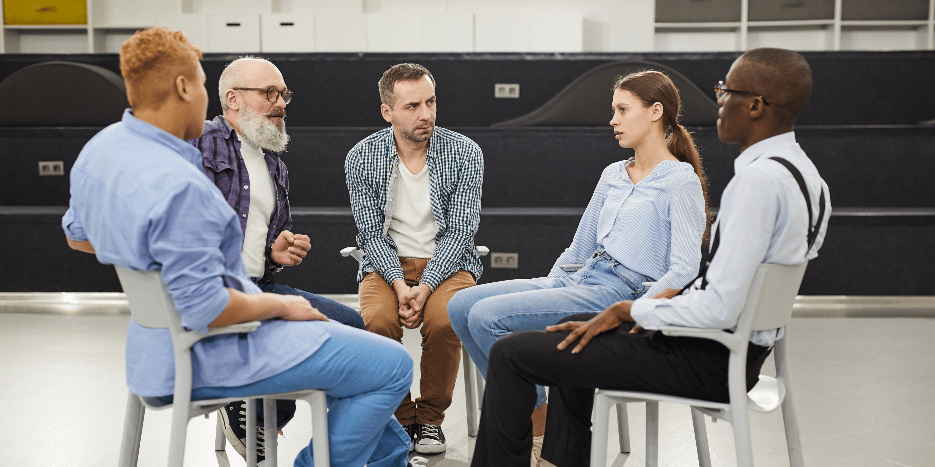 Group of people discussing mental health